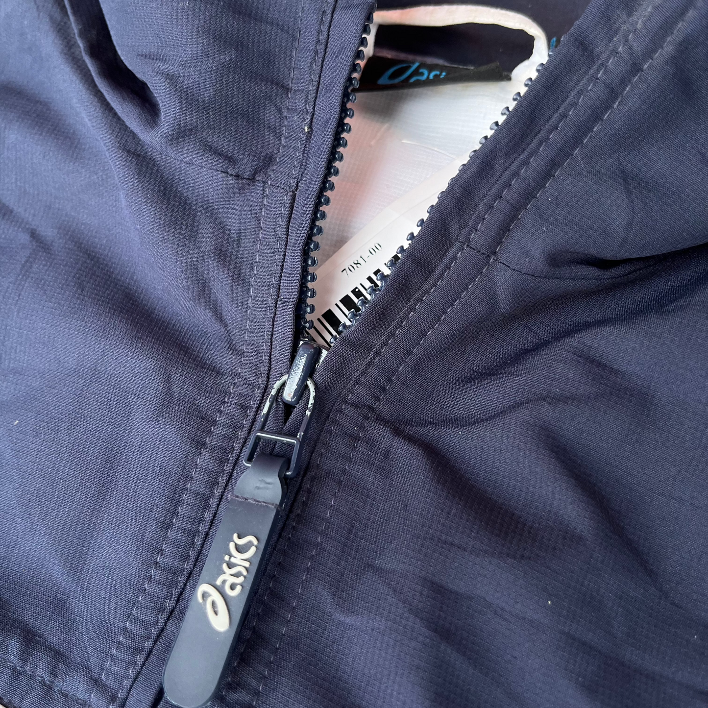 Asics Jacke (L)